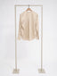 Silk blouse, signature cut.